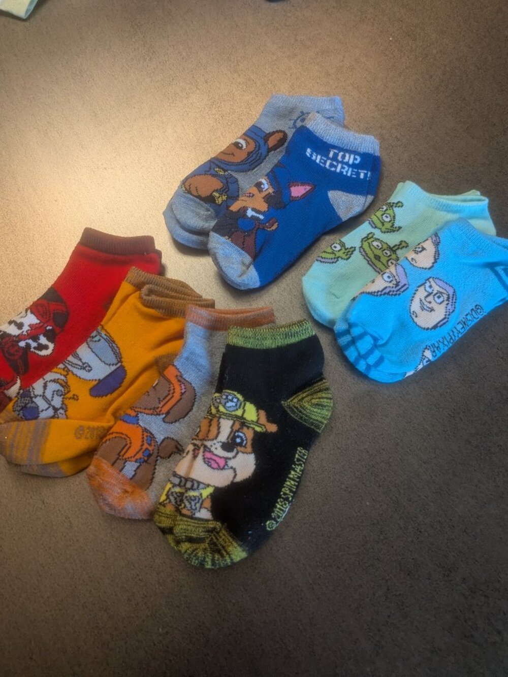 3/$10 - Bundle of 8 Paw Patrol + Toy Story Ankle Socks - M